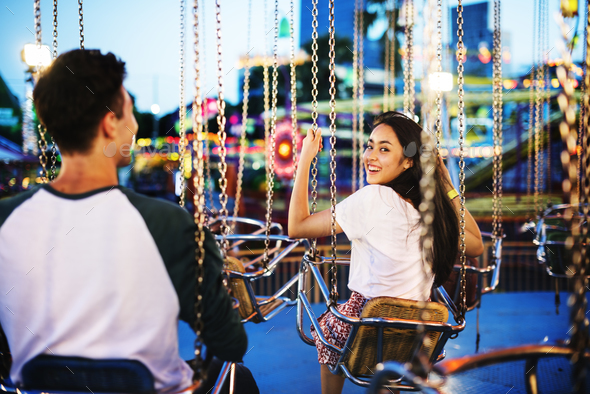 “Carousel of Love: Romantic Rides at the Amusement Park”